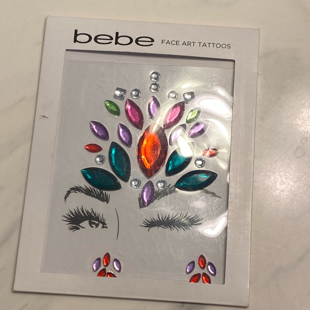 Bebe Face Art Tattoos with Vibrant Gems